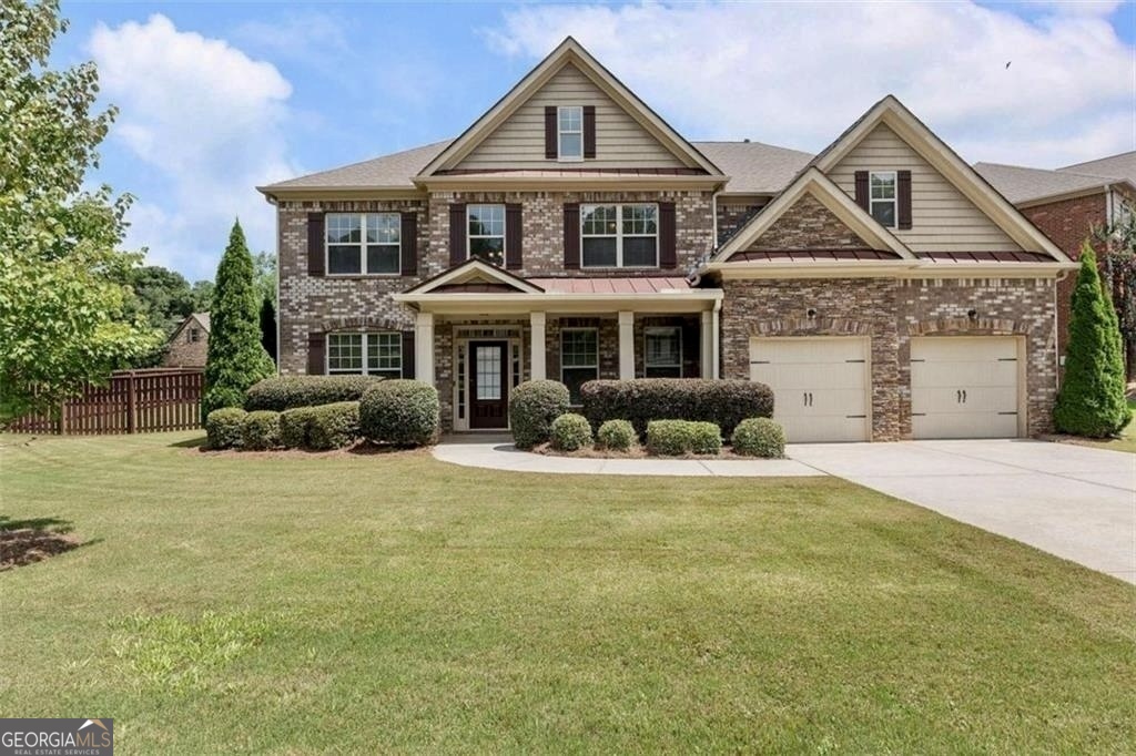 a front view of a house with swimming pool