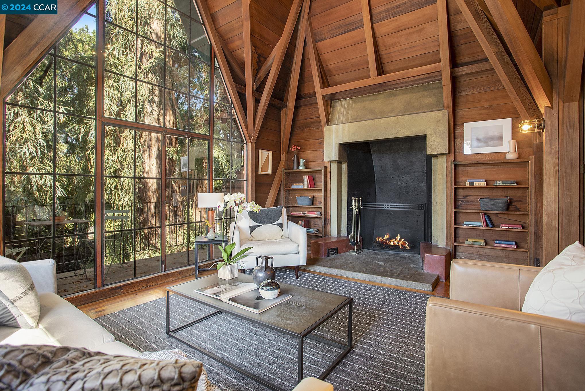 a outdoor living space with patio furniture and a fireplace