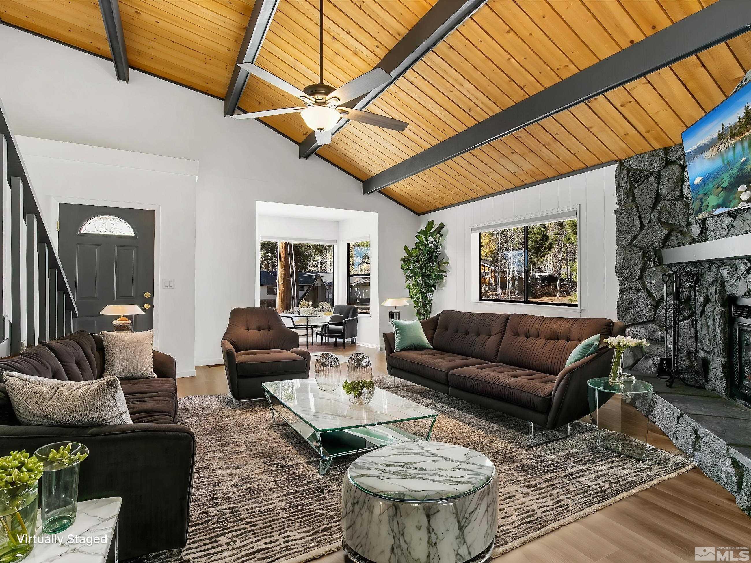 a living room with furniture and a rug