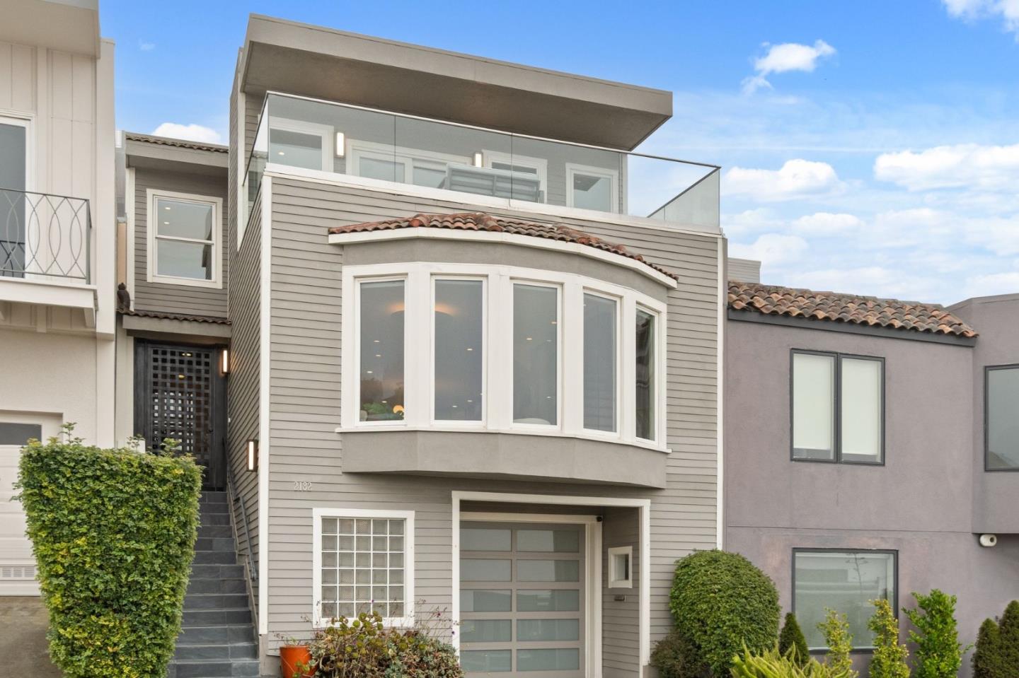 a front view of a house with balcony