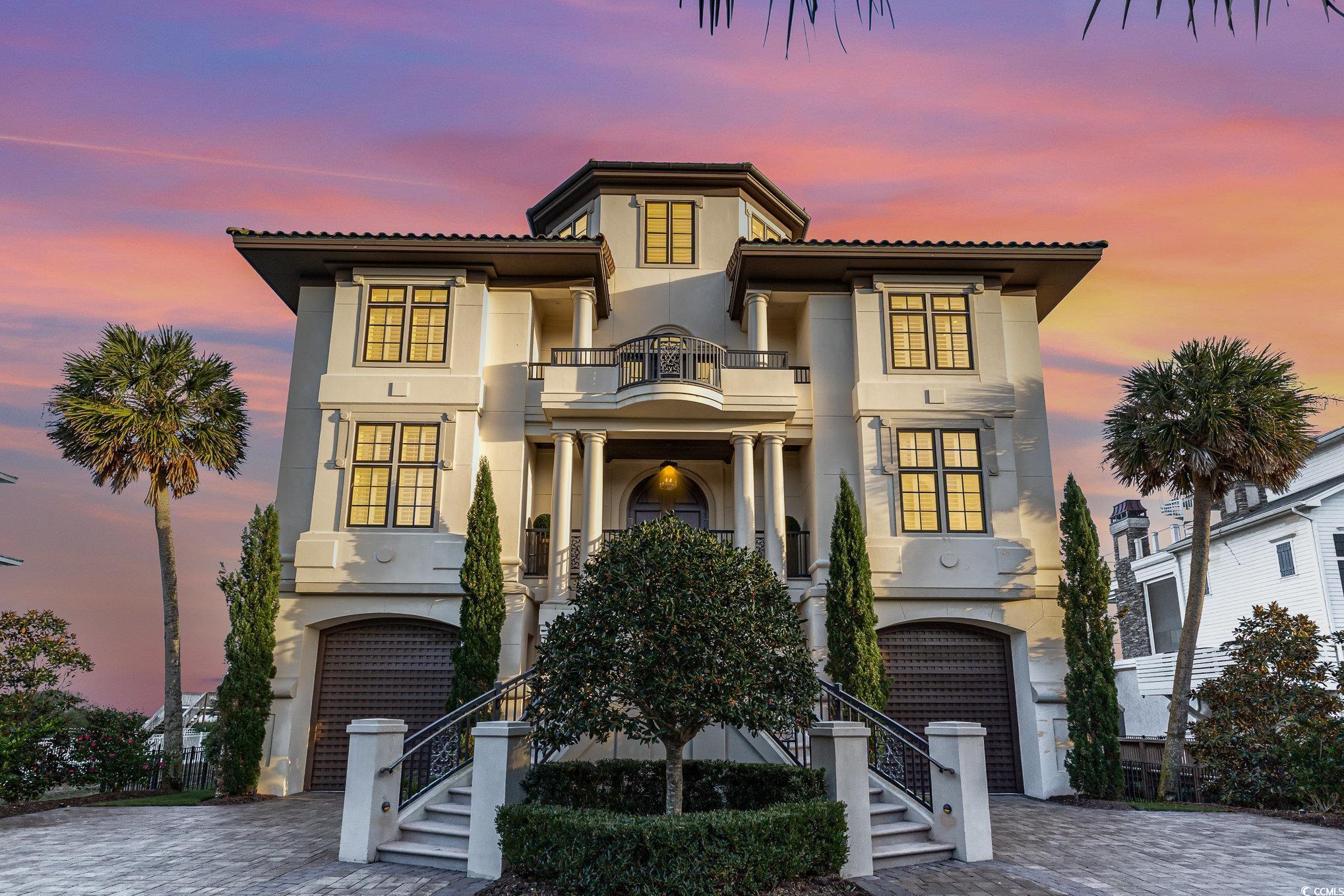 Mediterranean / spanish-style home with a balcony