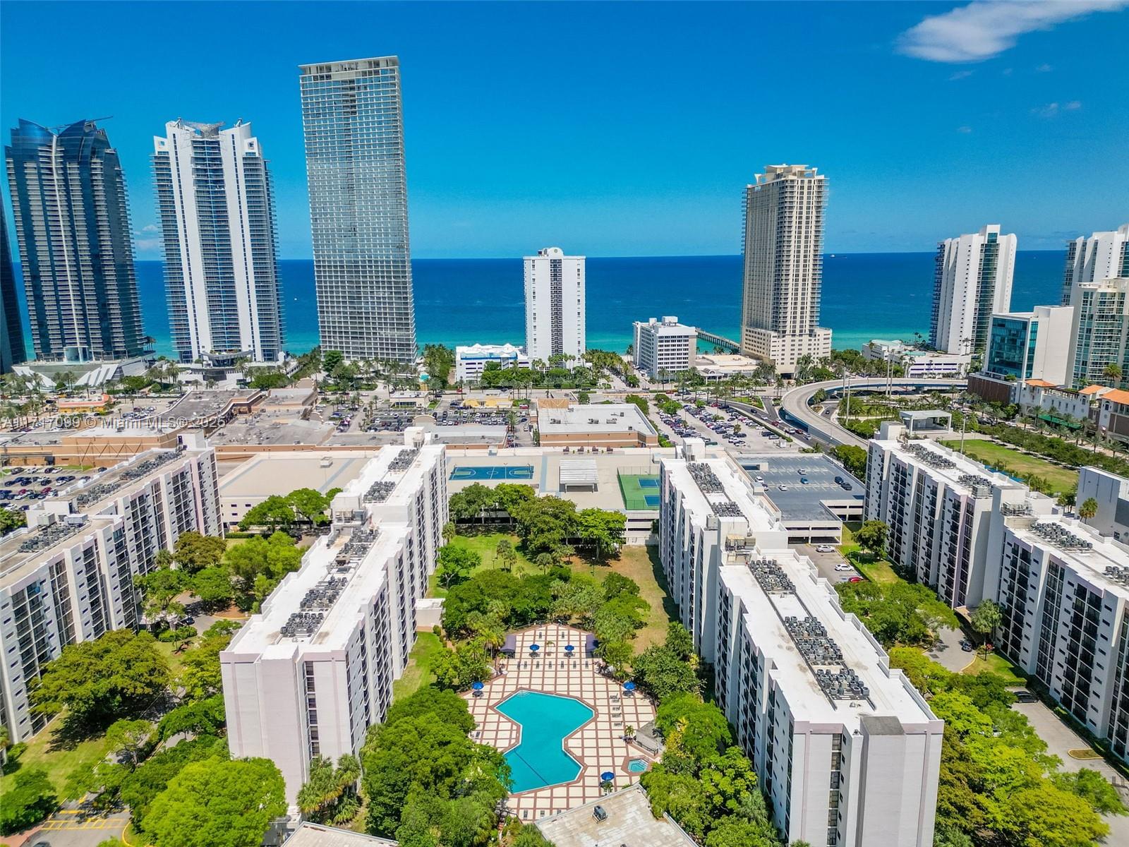 a view of a city with tall buildings