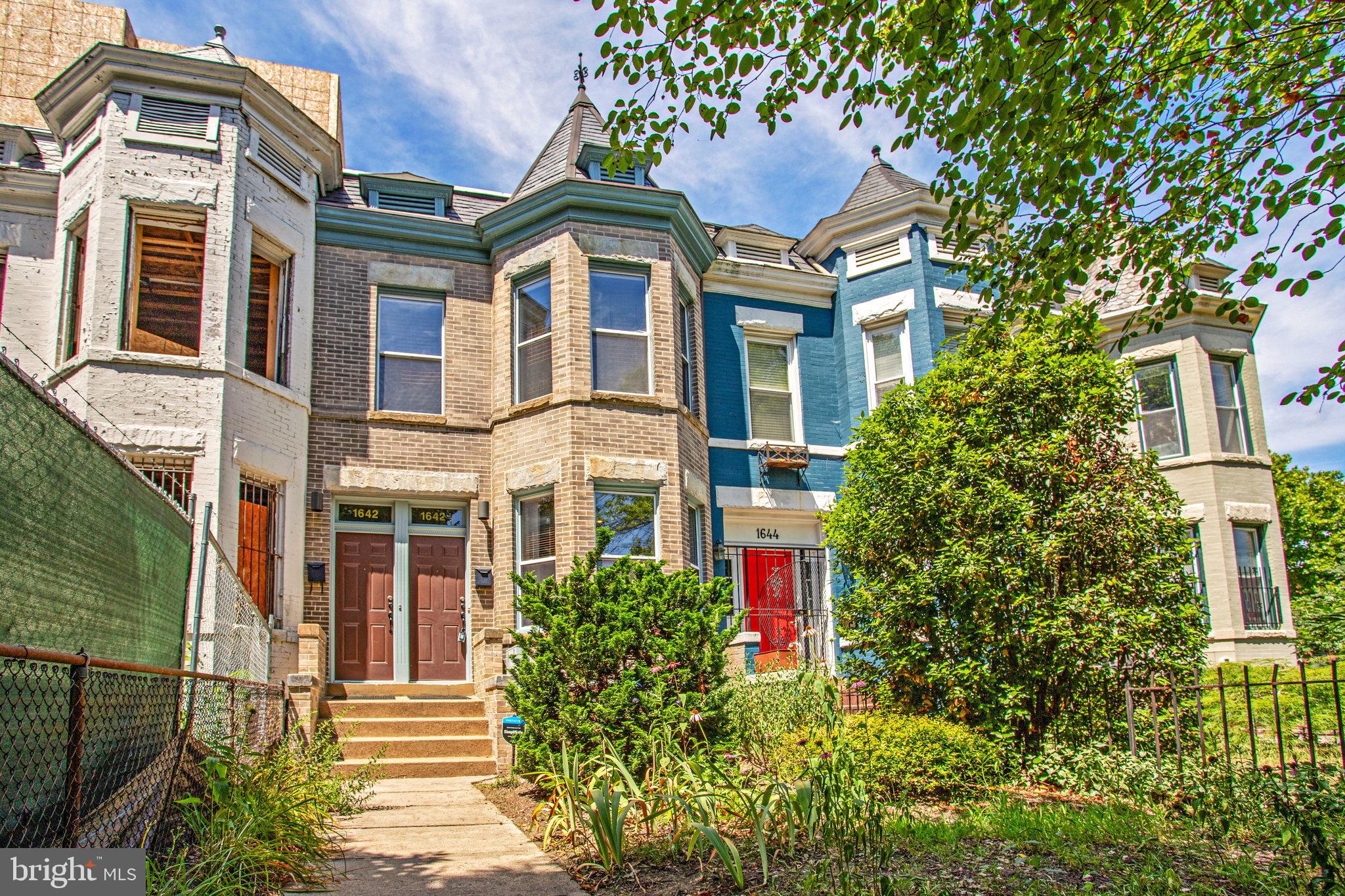 a front view of a multi story residential apartment buildings