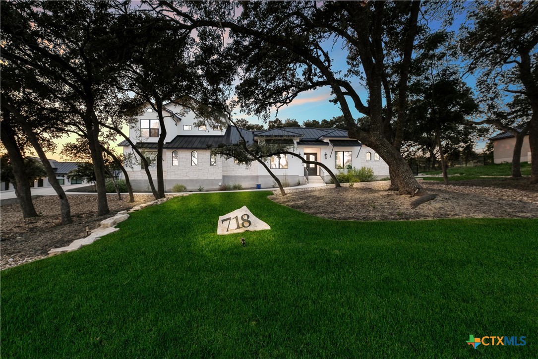 a view of a backyard with a garden