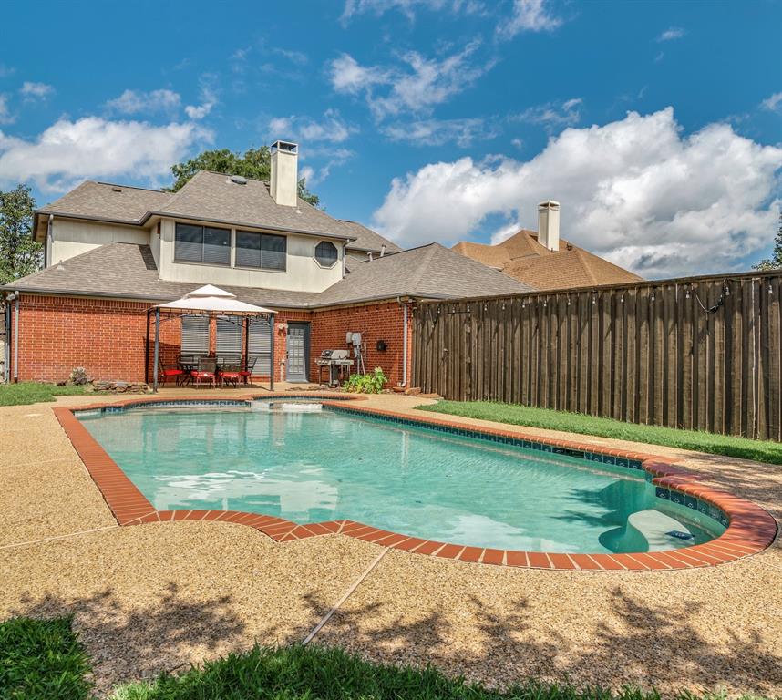 a view of a house with a swimming pool