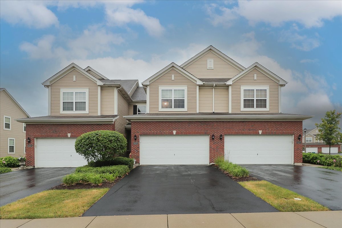 front view of a house with a garage