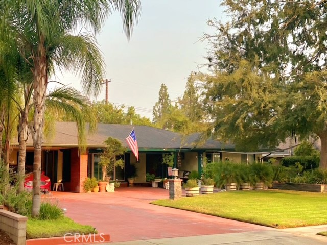 a front view of a building with yard