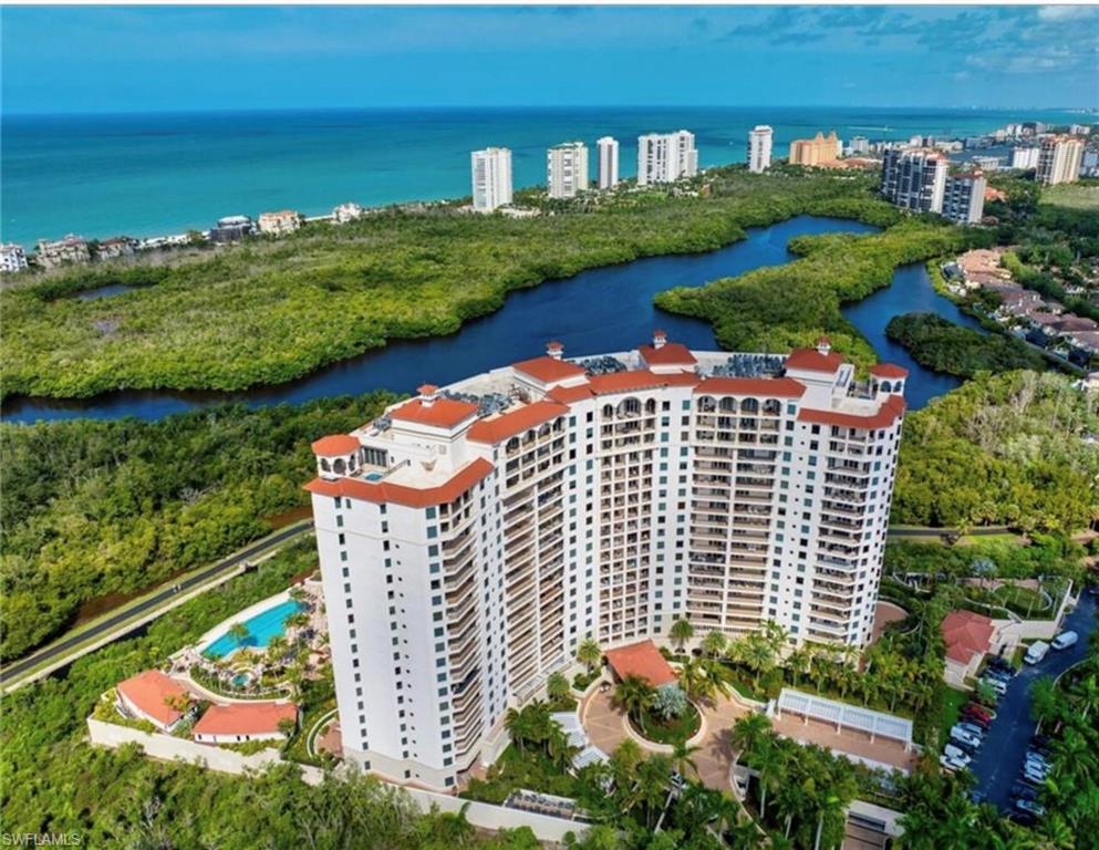 a view of a city with an ocean view