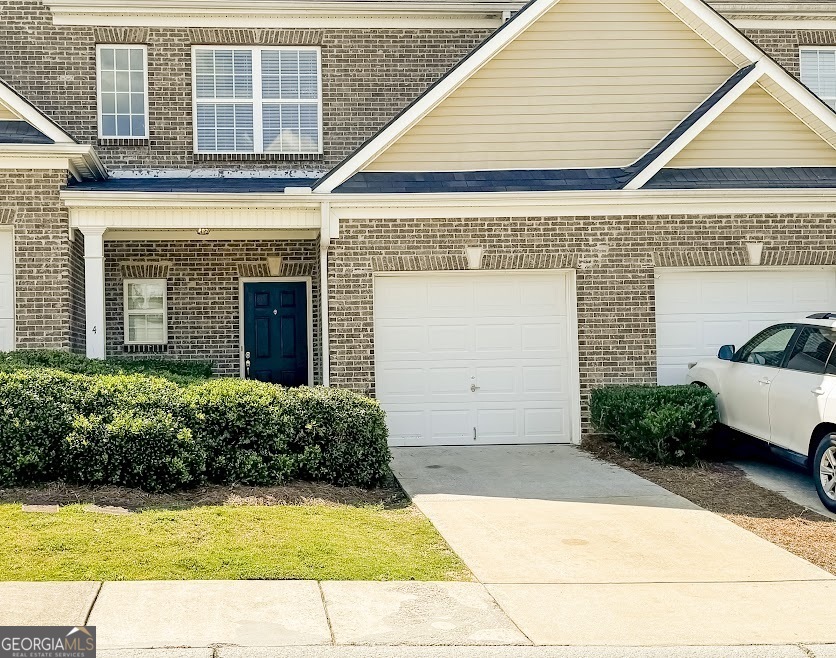 a view of outdoor space yard and front door