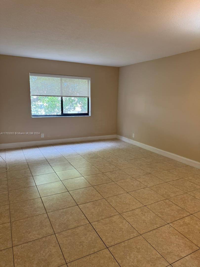 a view of an empty room with window