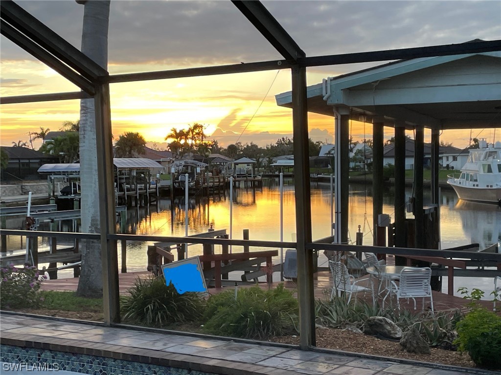 a view of swimming pool with outdoor seating