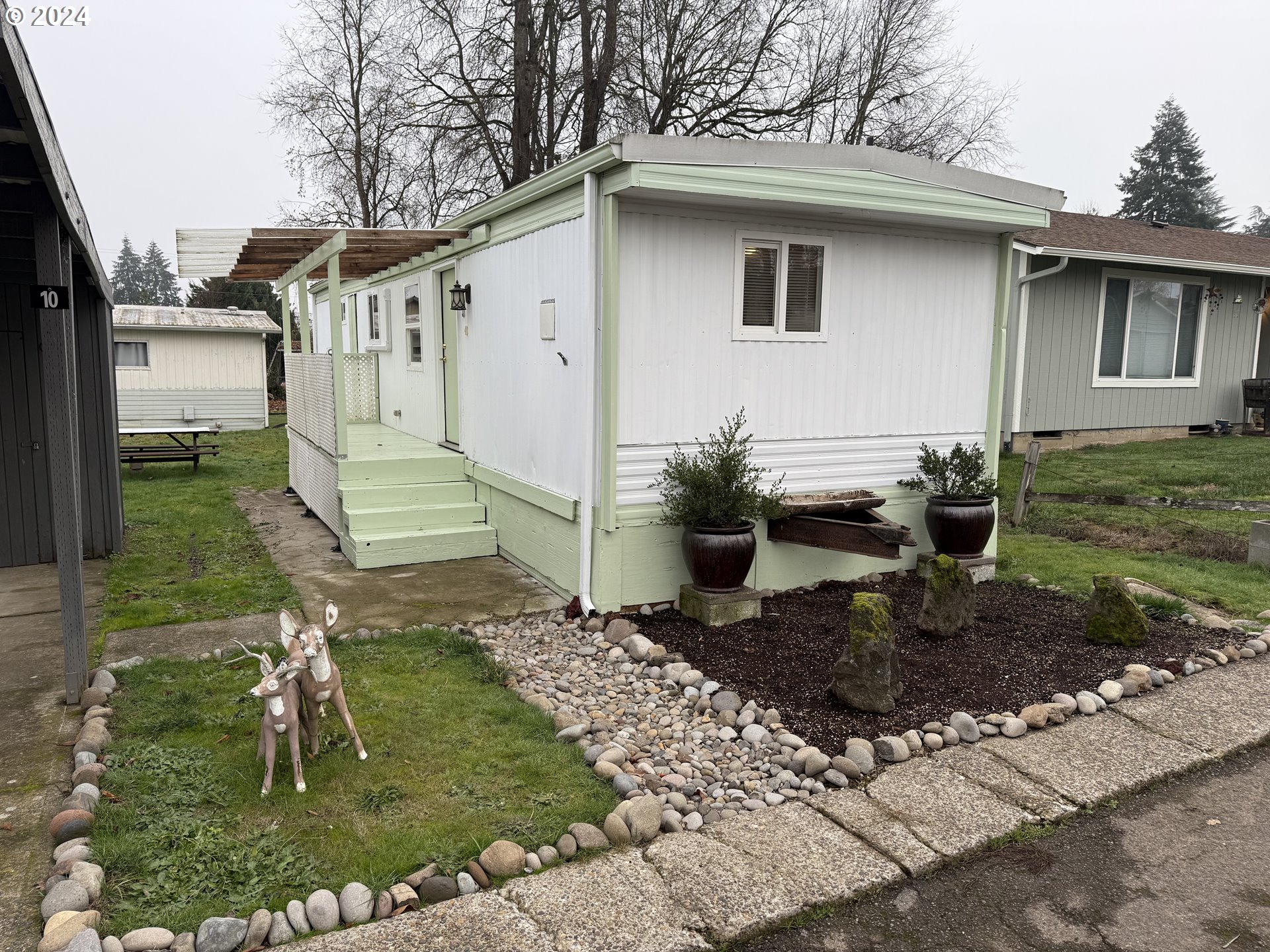 a backyard of a house with seating space