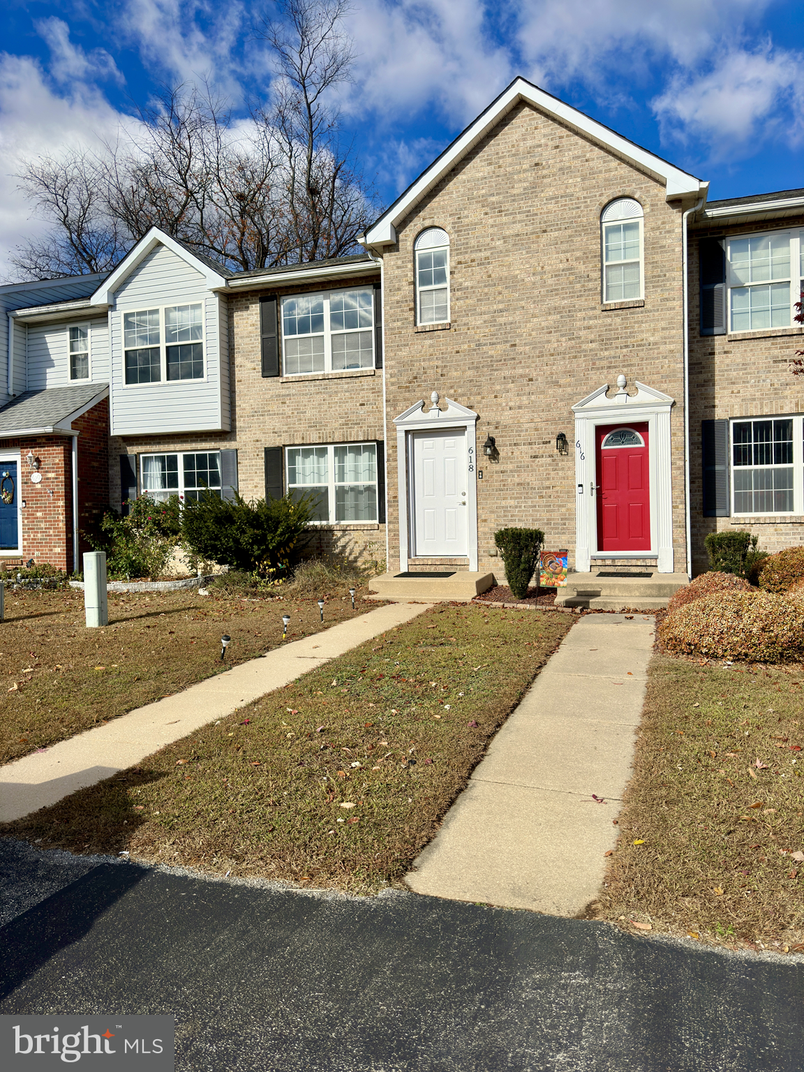 a front view of multiple houses