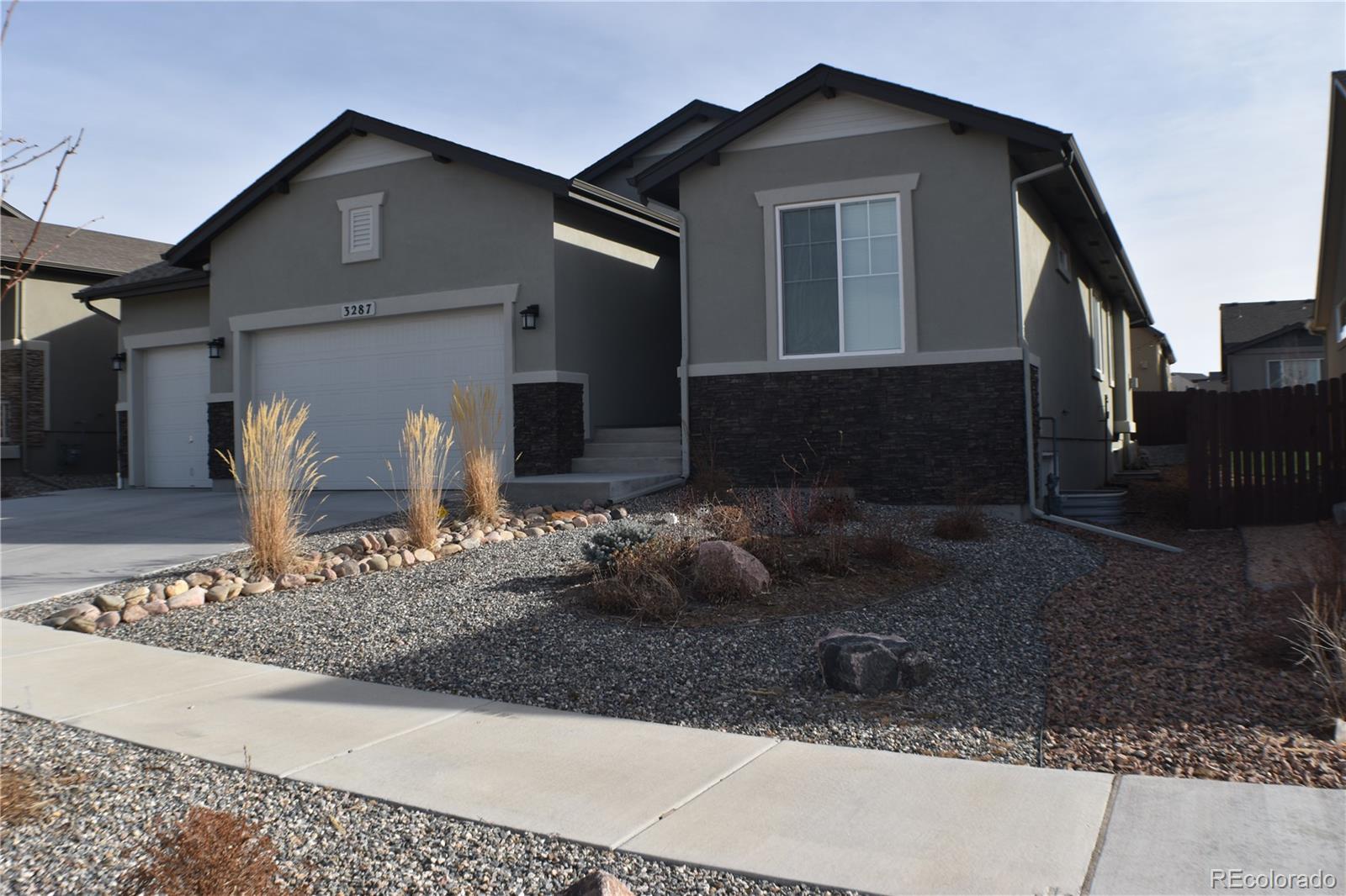 a front view of a house with entertaining space