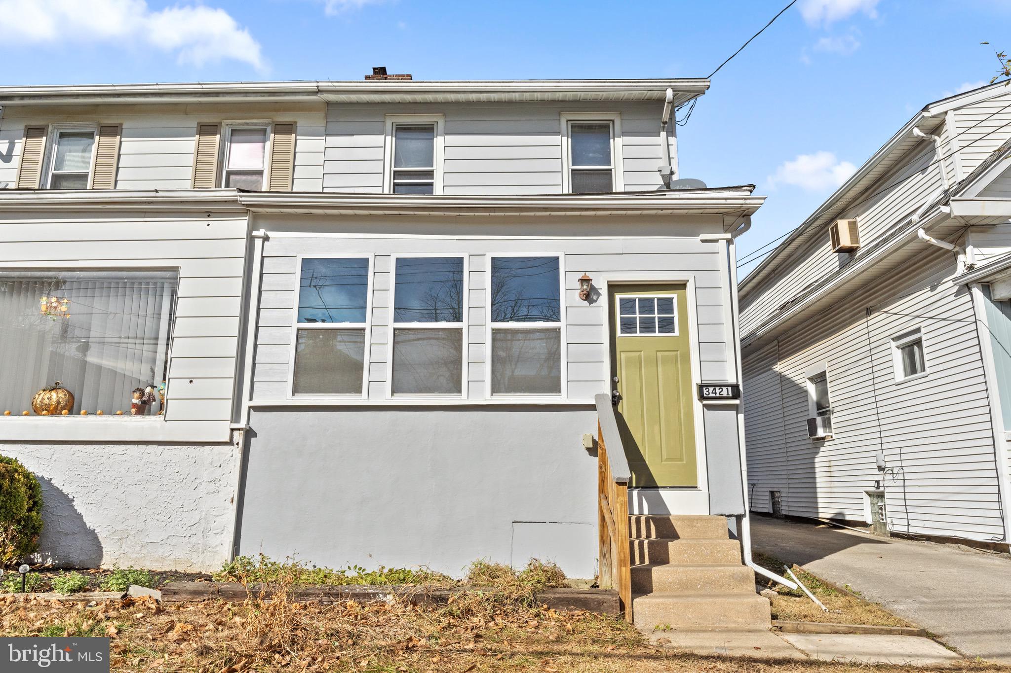 a front view of a house with a floor