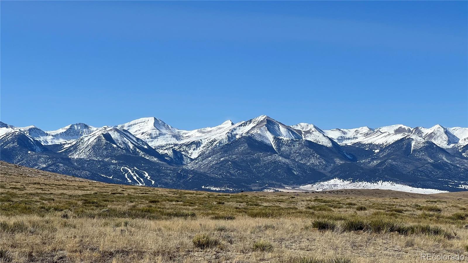 a view of water with a mountain