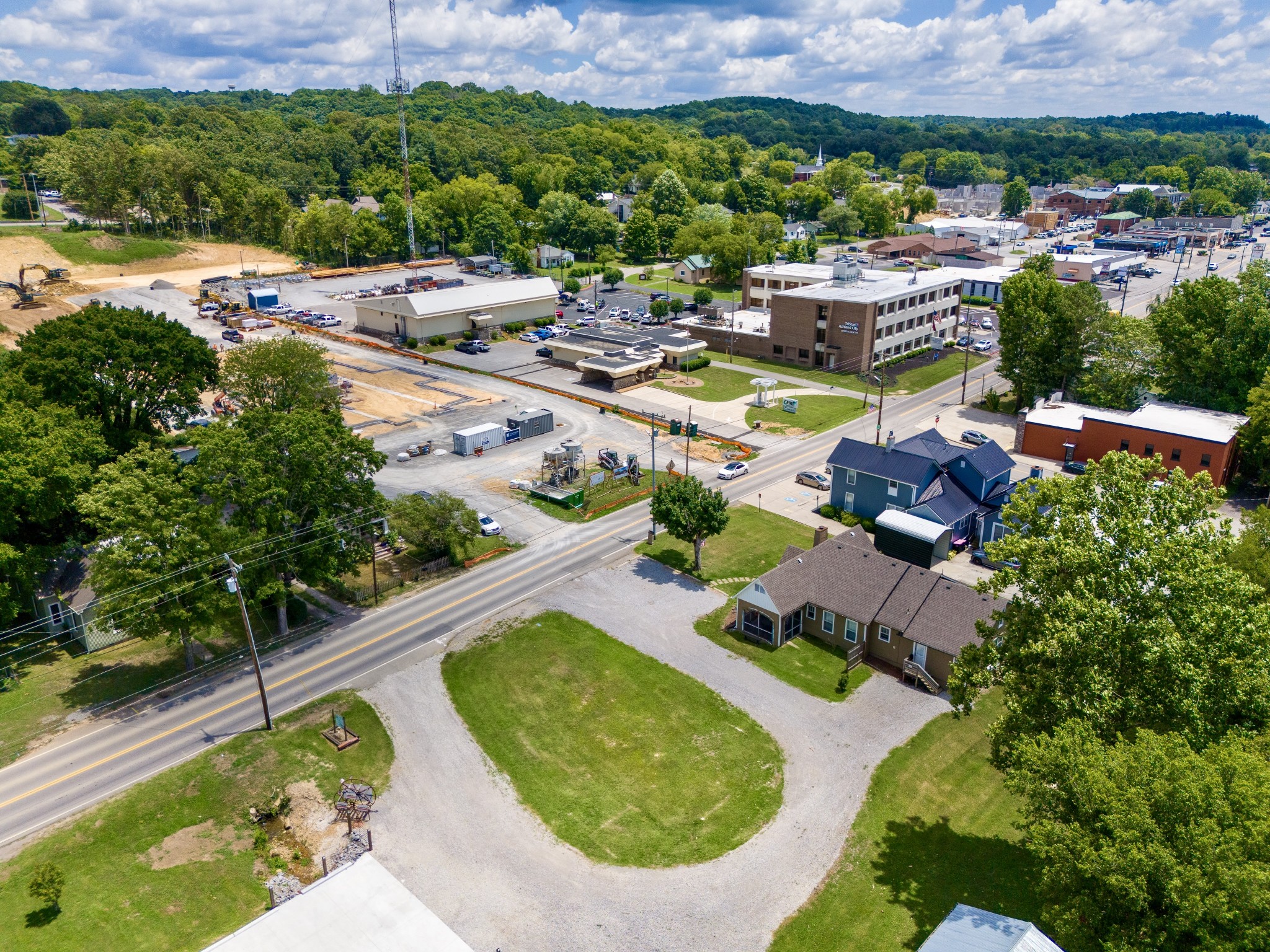 an aerial view of residential houses with outdoor space