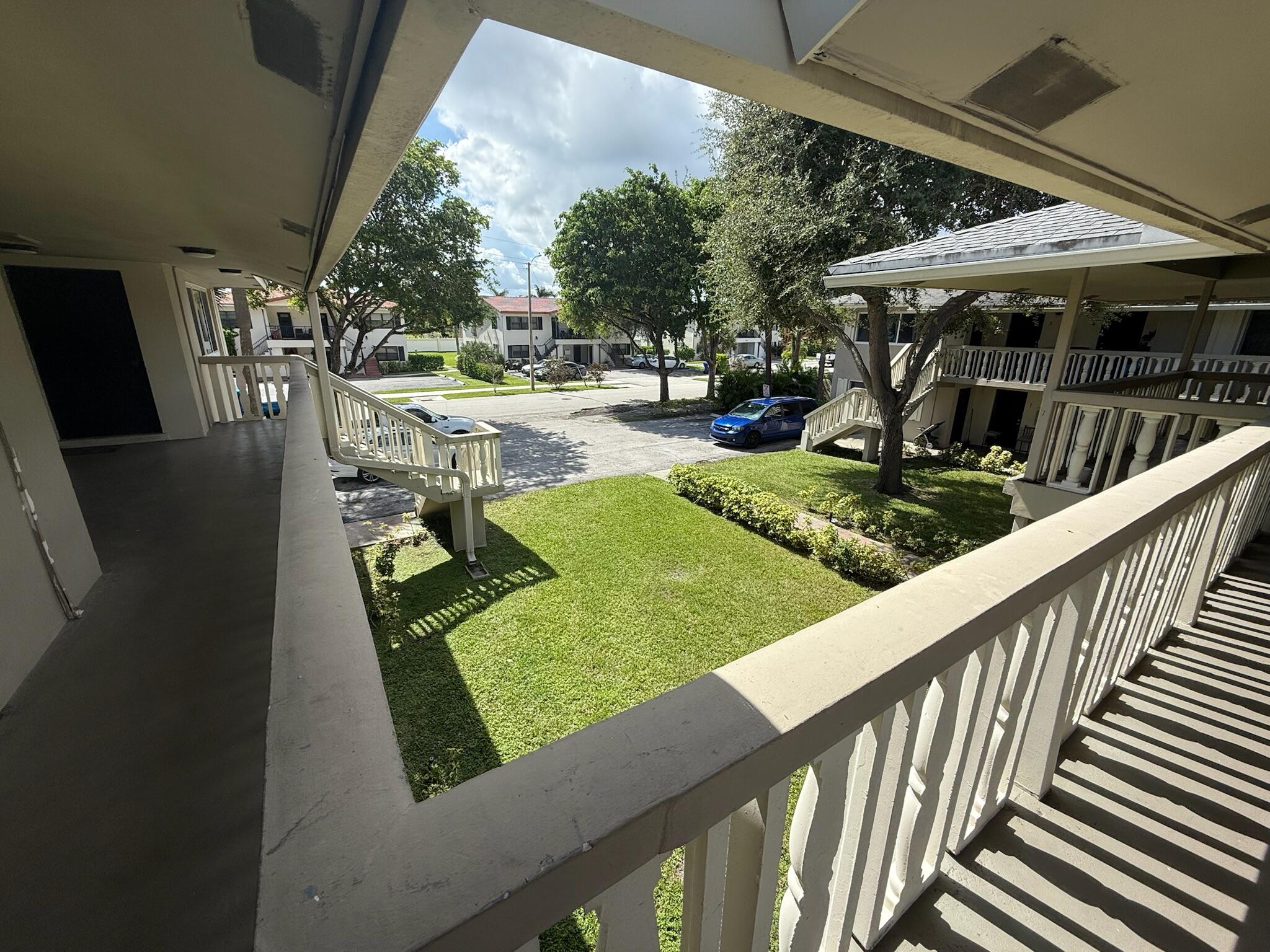 a view of swimming pool with seating area