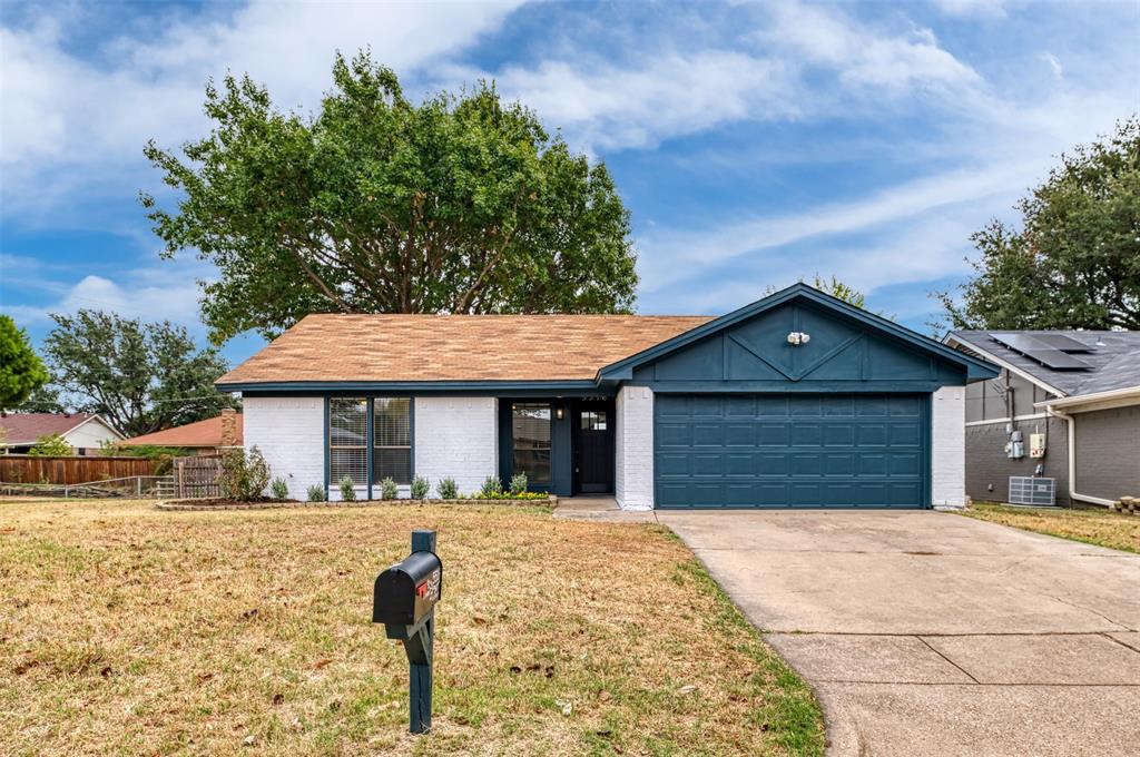 a front view of a house with yard