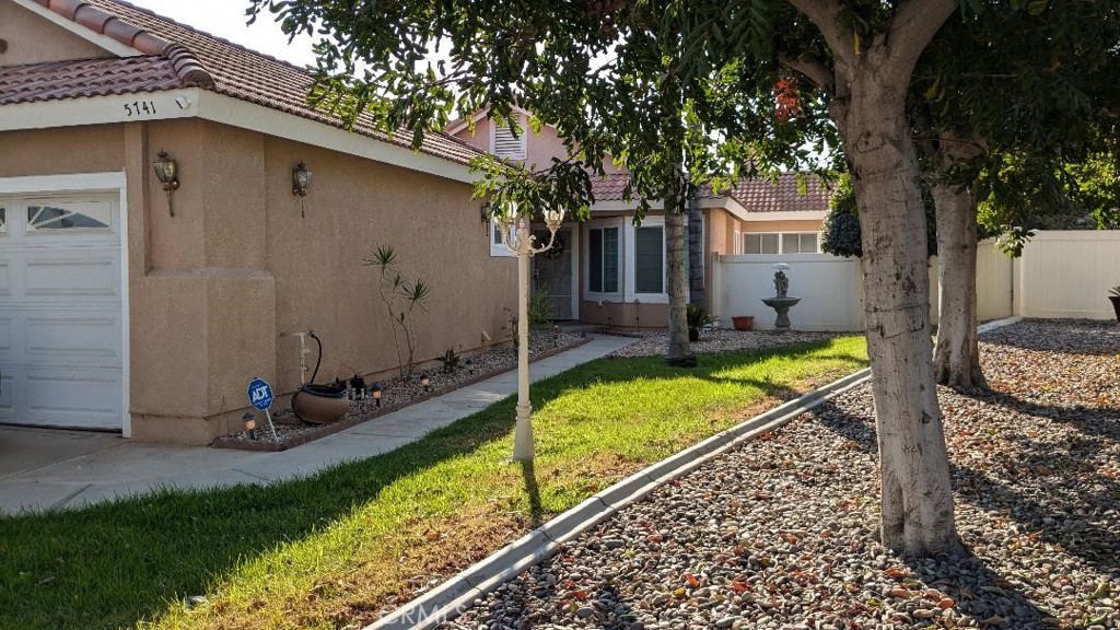 a view of a backyard with a garden