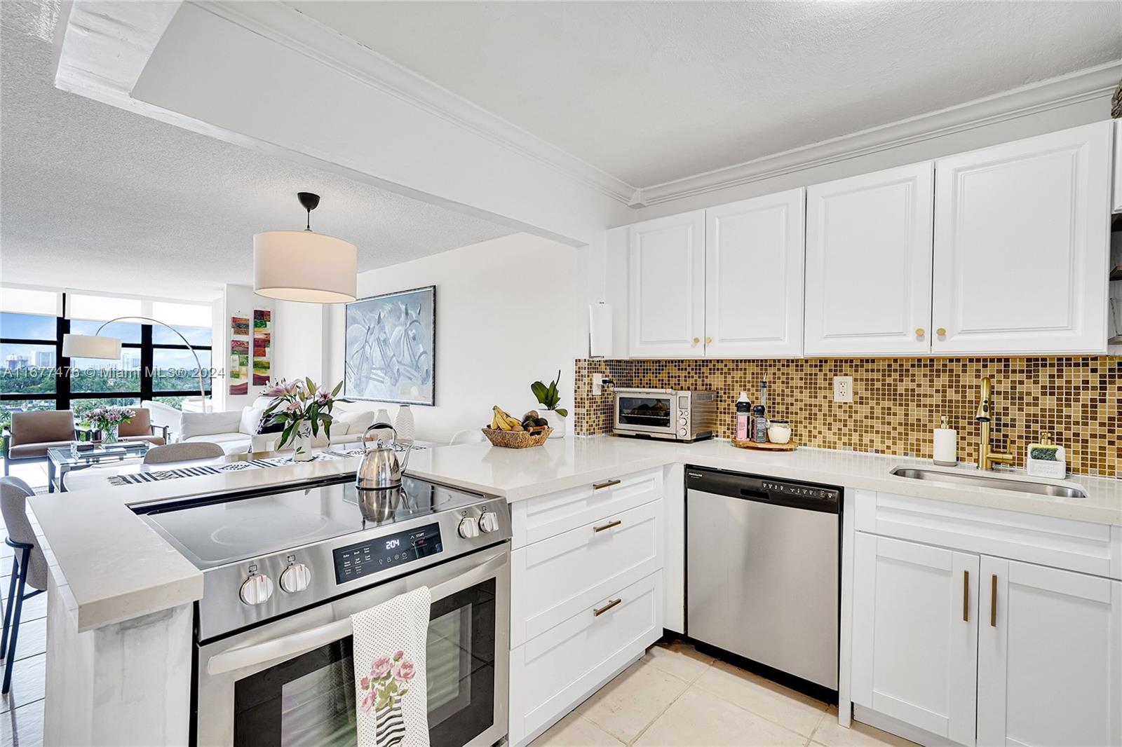 a kitchen with a sink stove and cabinets