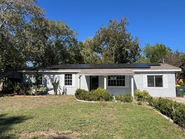 front view of house with a yard