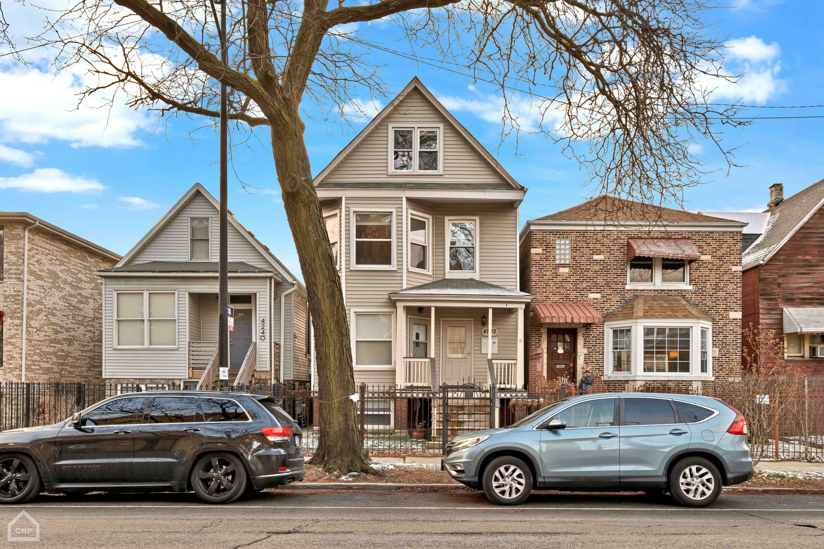 a car parked in front of a house