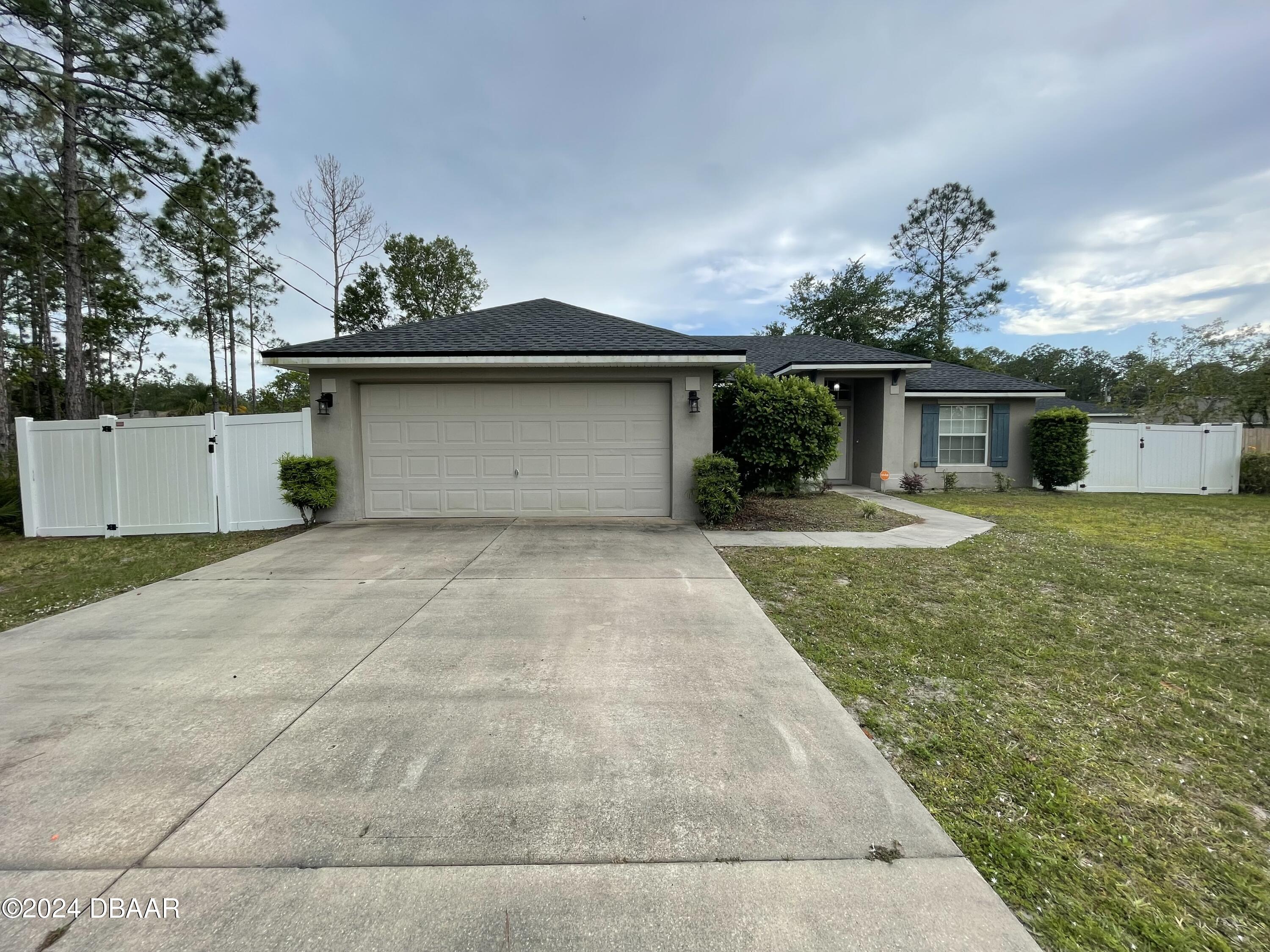 a front view of house with yard