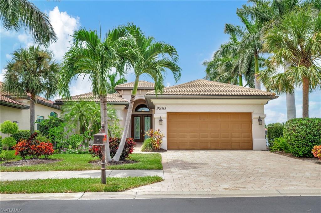 Mediterranean / spanish-style house featuring a garage