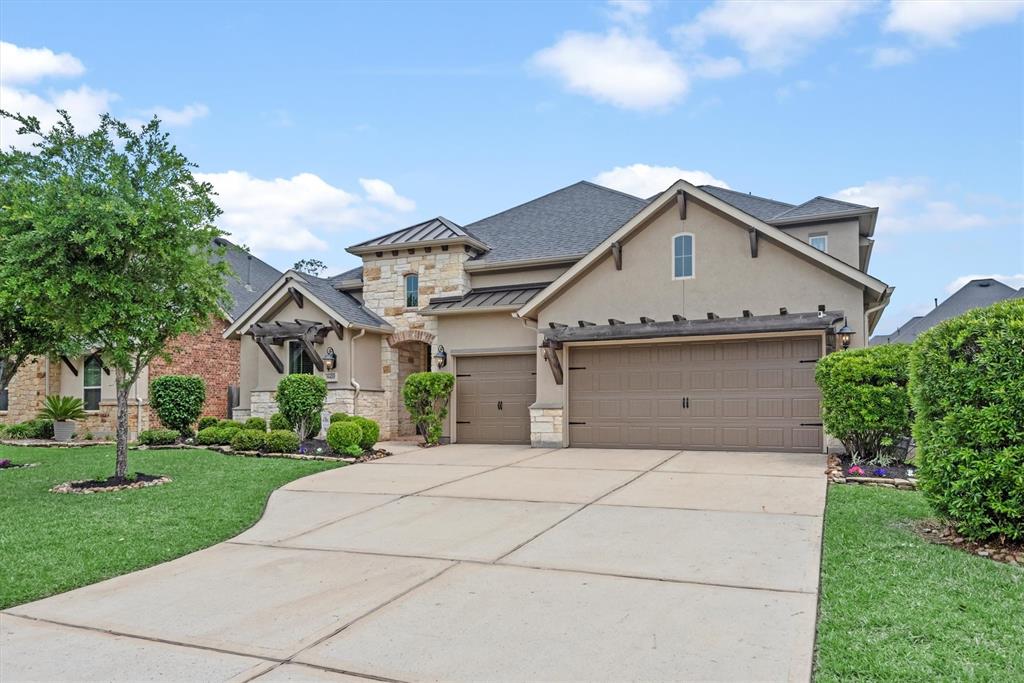 a front view of a house with yard