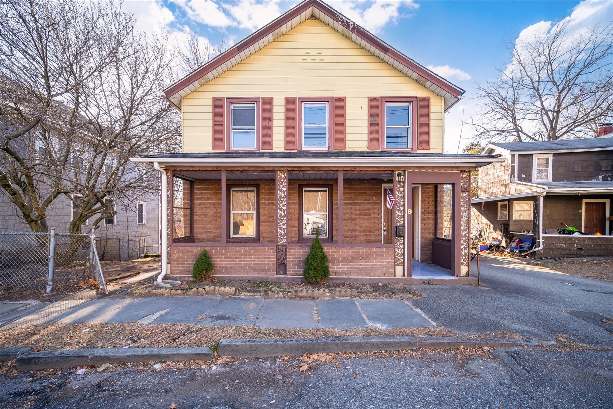 View of front property featuring a porch