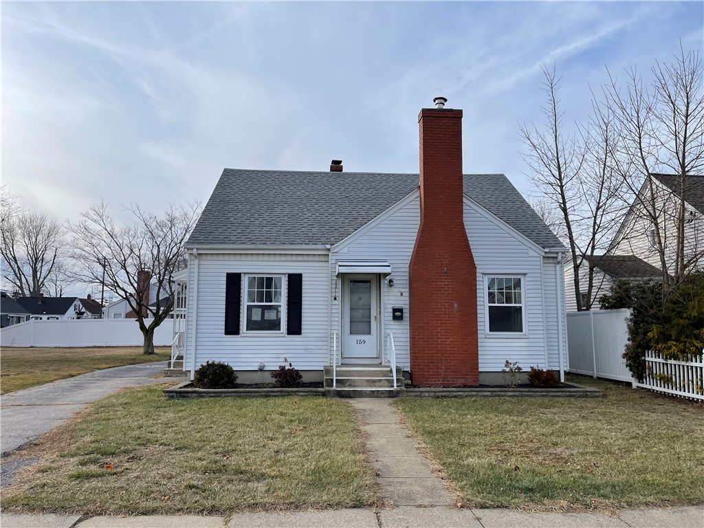 Note:  Vacant lot to left of driveway is not part