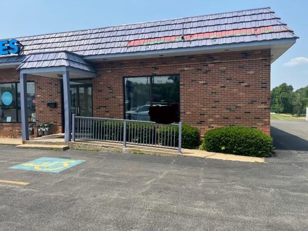 a view of a brick building with a outdoor space