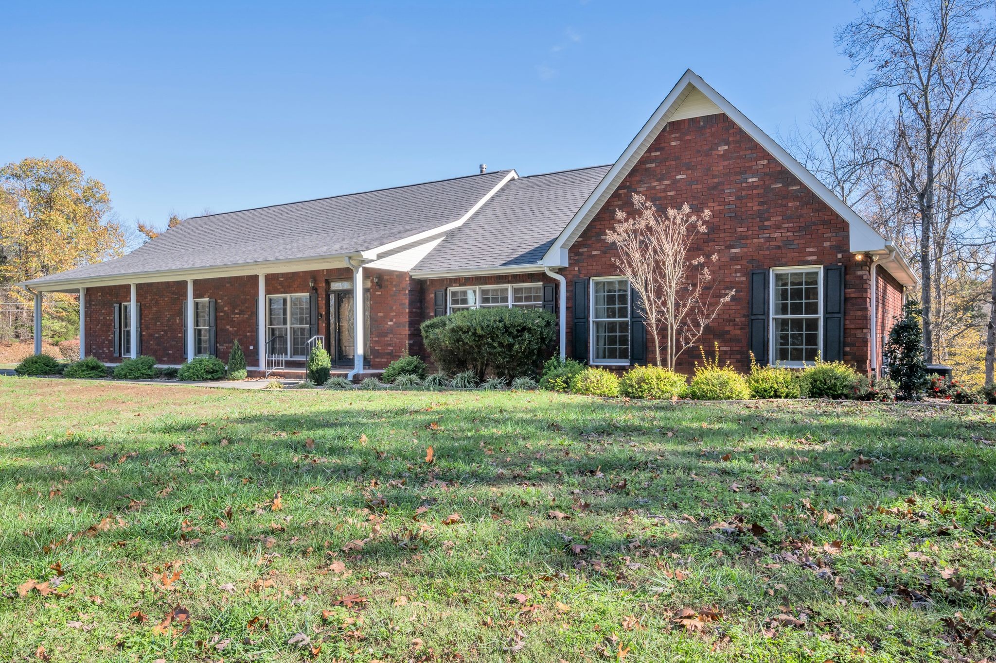 front view of a house with a yard