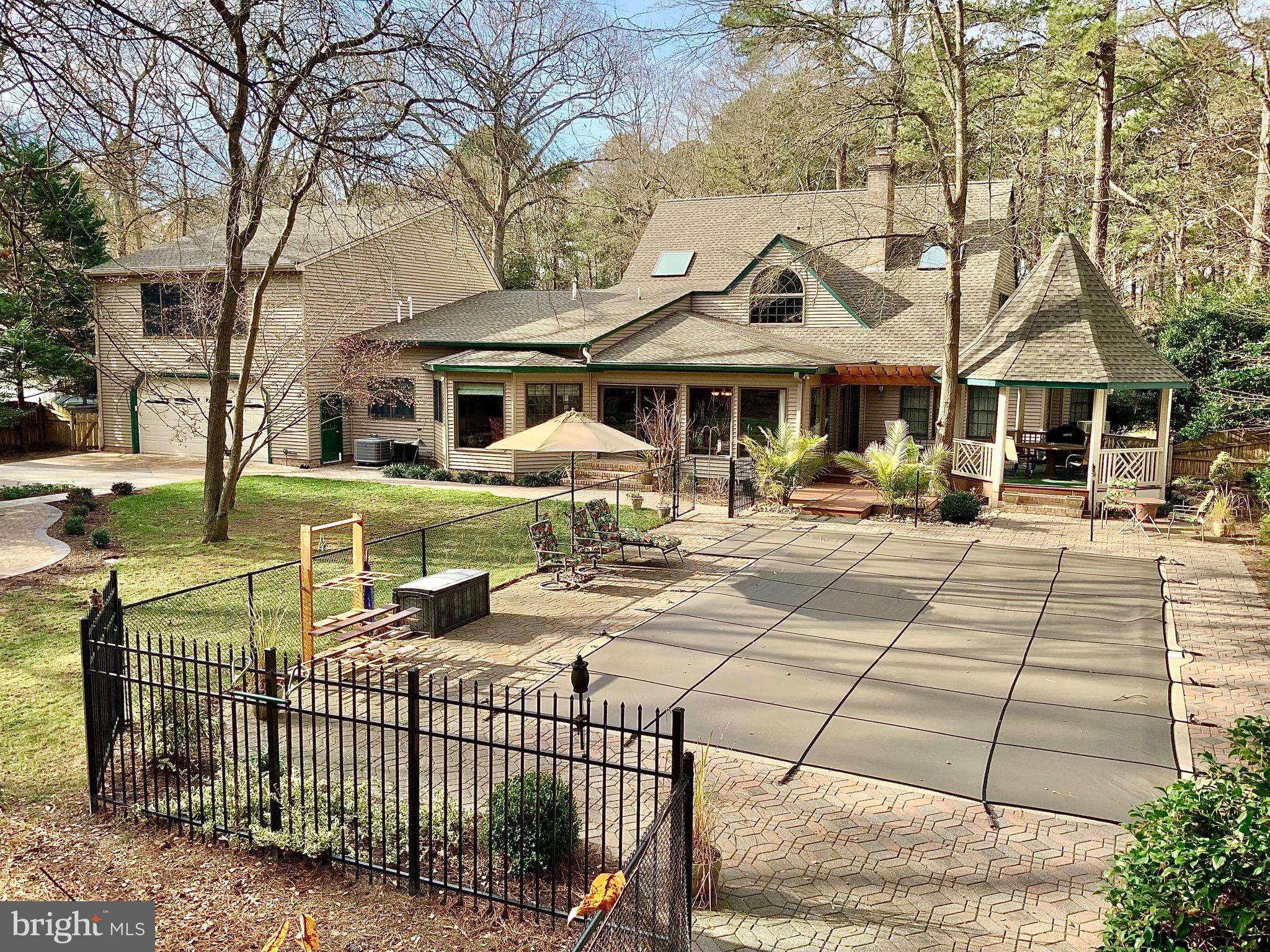 a front view of a building with garden