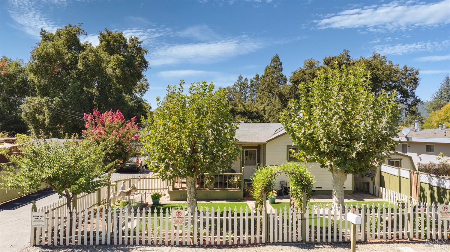 a house view with a garden space