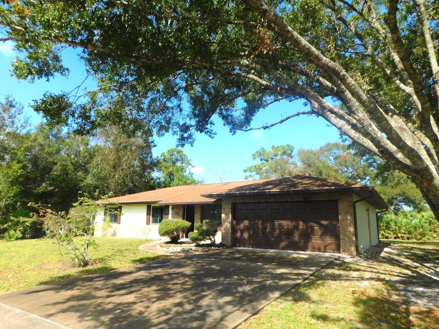 a view of a house with a patio