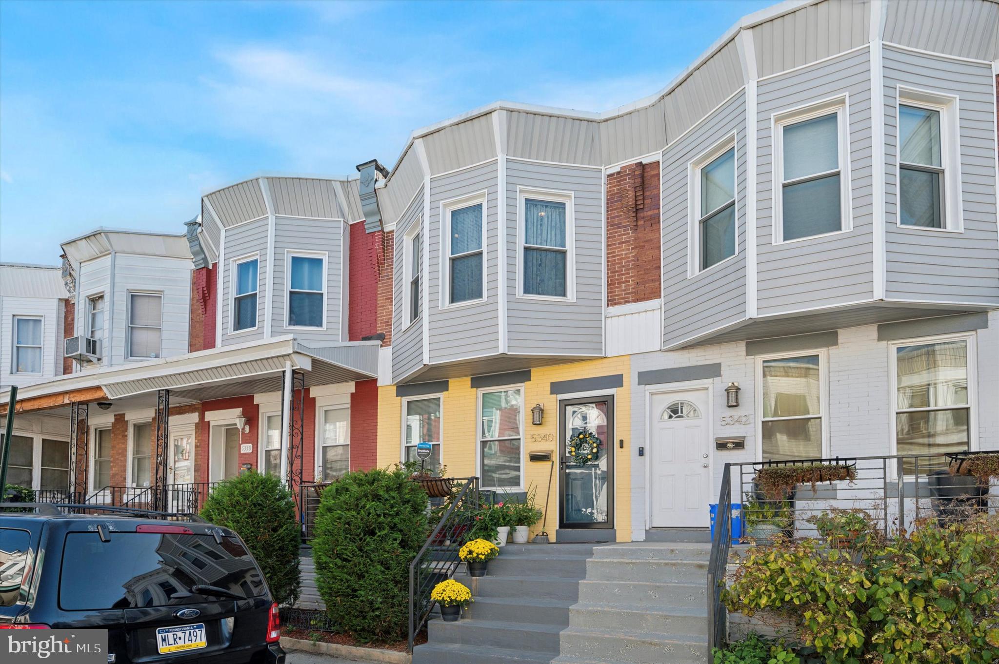 a front view of a multi story residential apartment building