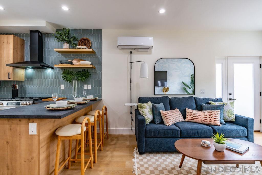 a living room with furniture and a table