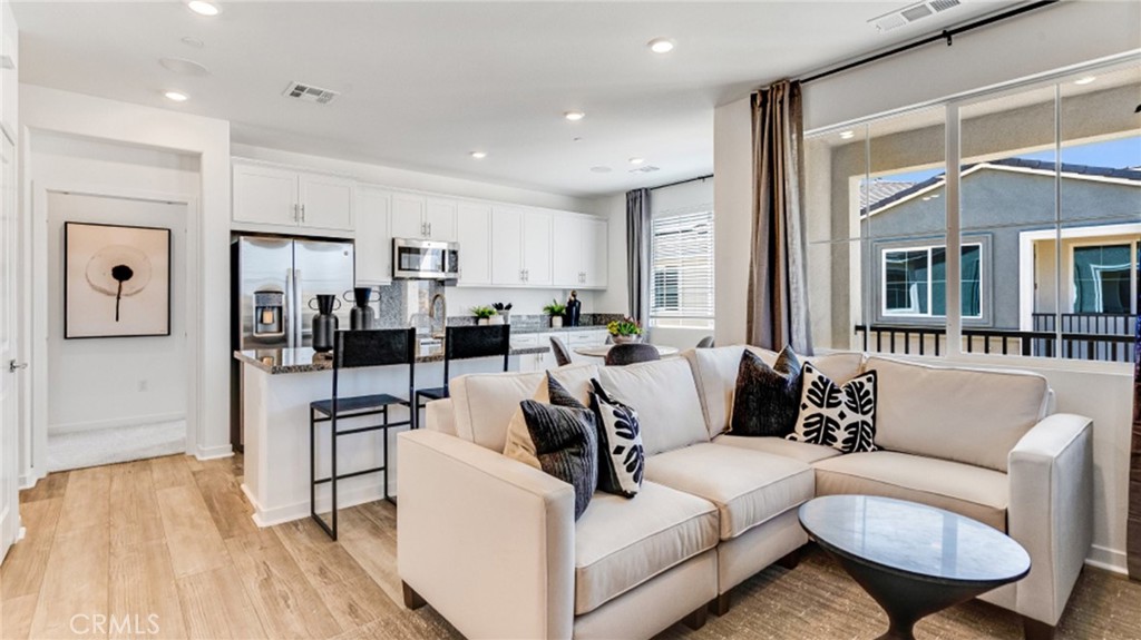 a living room with furniture and a table