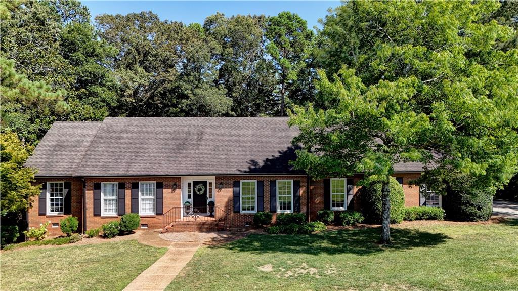 front view of a house with a yard