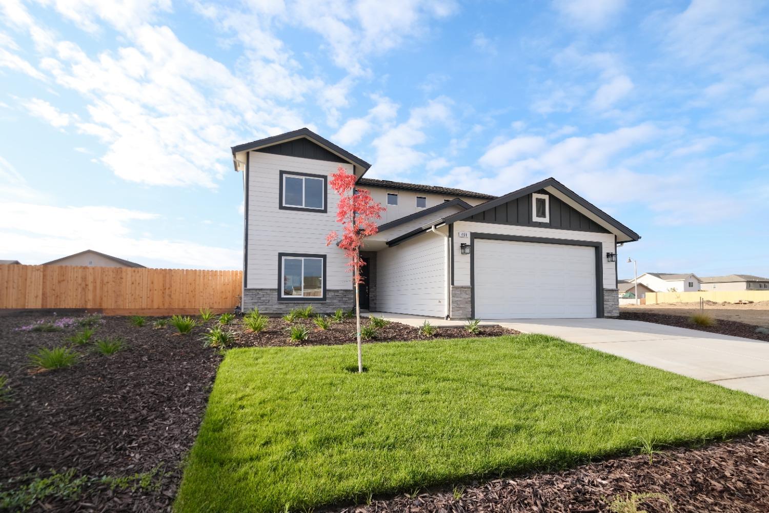 a house view with a garden space