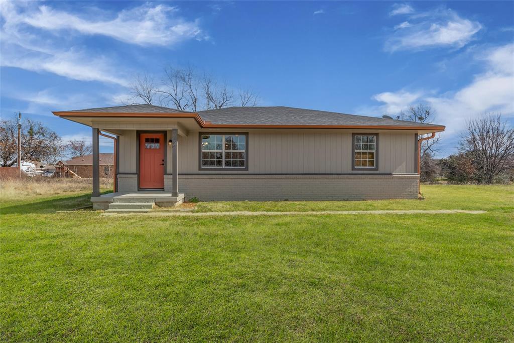 Welcome home to the lake lifestyle with a charming home, a large lot, and covered front porch.