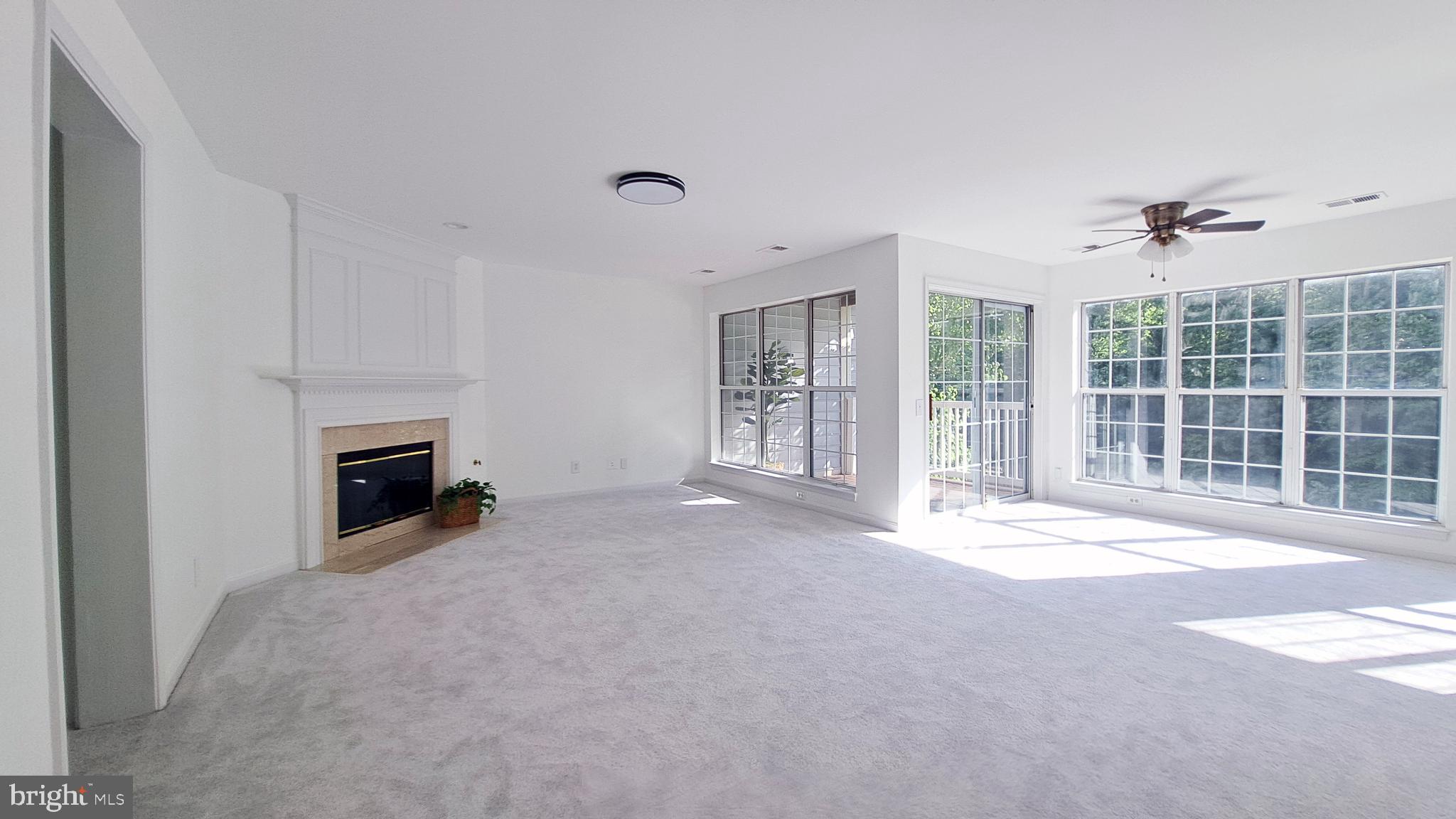 a view of a livingroom with a fireplace