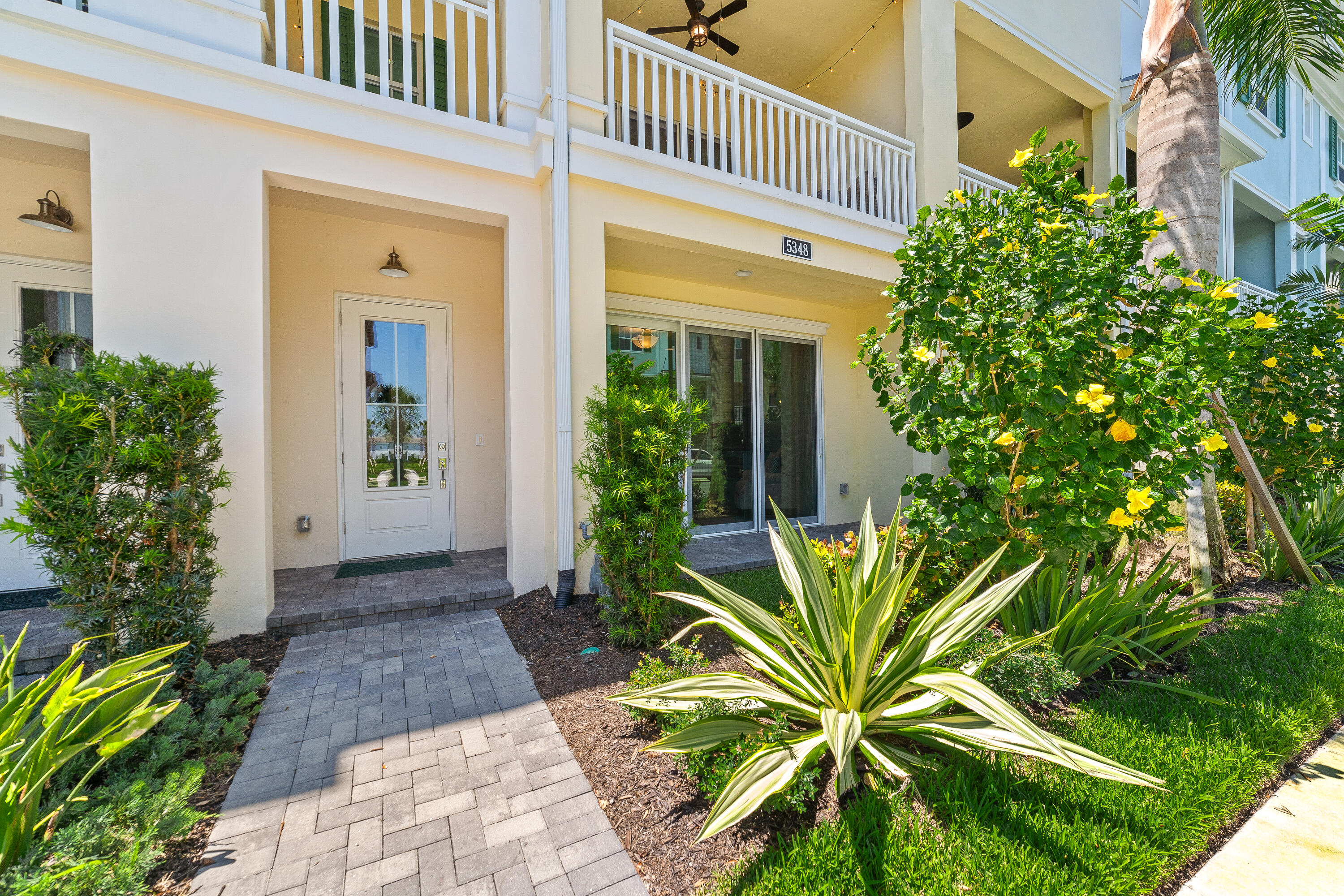 a view of front door and yard