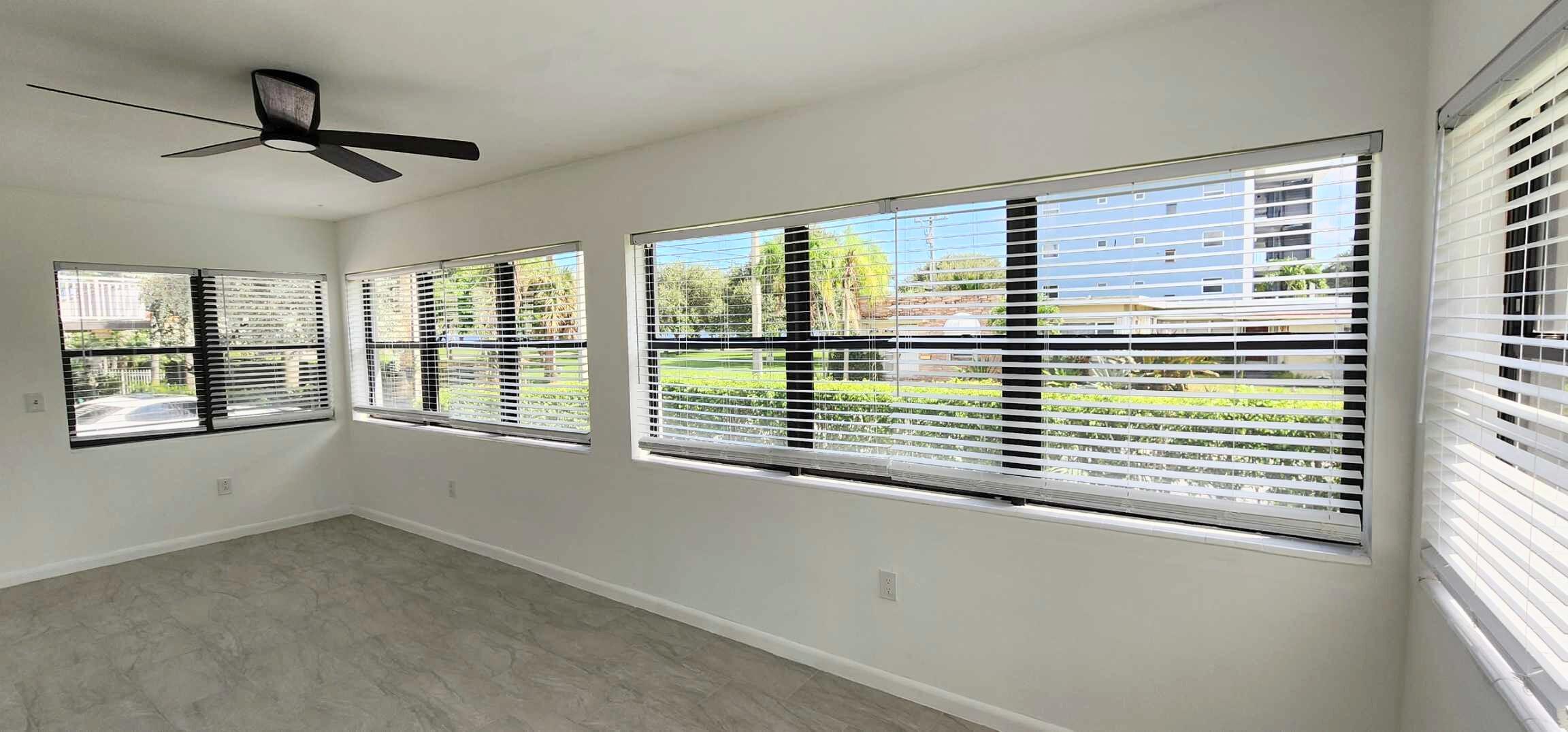 a view of a room that has a window in it