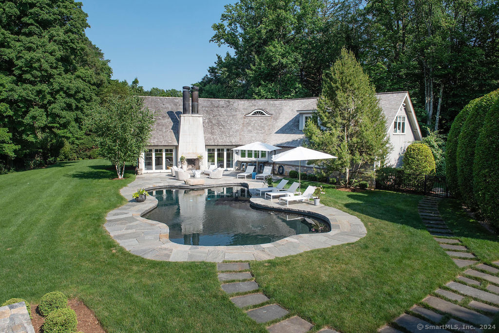 a view of a house with swimming pool