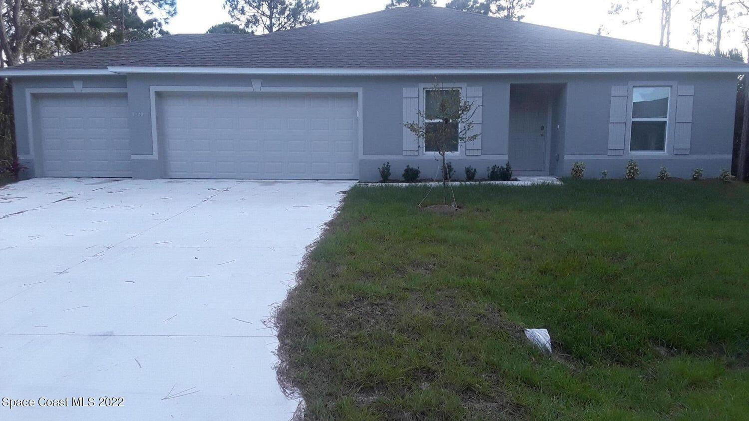 a front view of house with yard