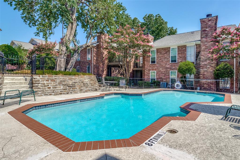 a view of a house with swimming pool