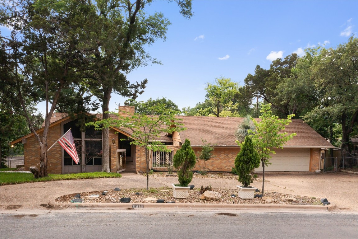 front view of a house with a street